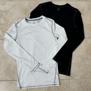 (2) Champion Boys’ Compression Shirts
Size: Large 
Color: (1) Black + (1) White